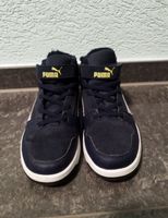 Baskets Puma montantes bleues taille 34 très bon état