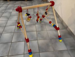 Spielbogen aus Holz bunt für Babys gebrauchter Zustand