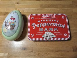 Two metal tins