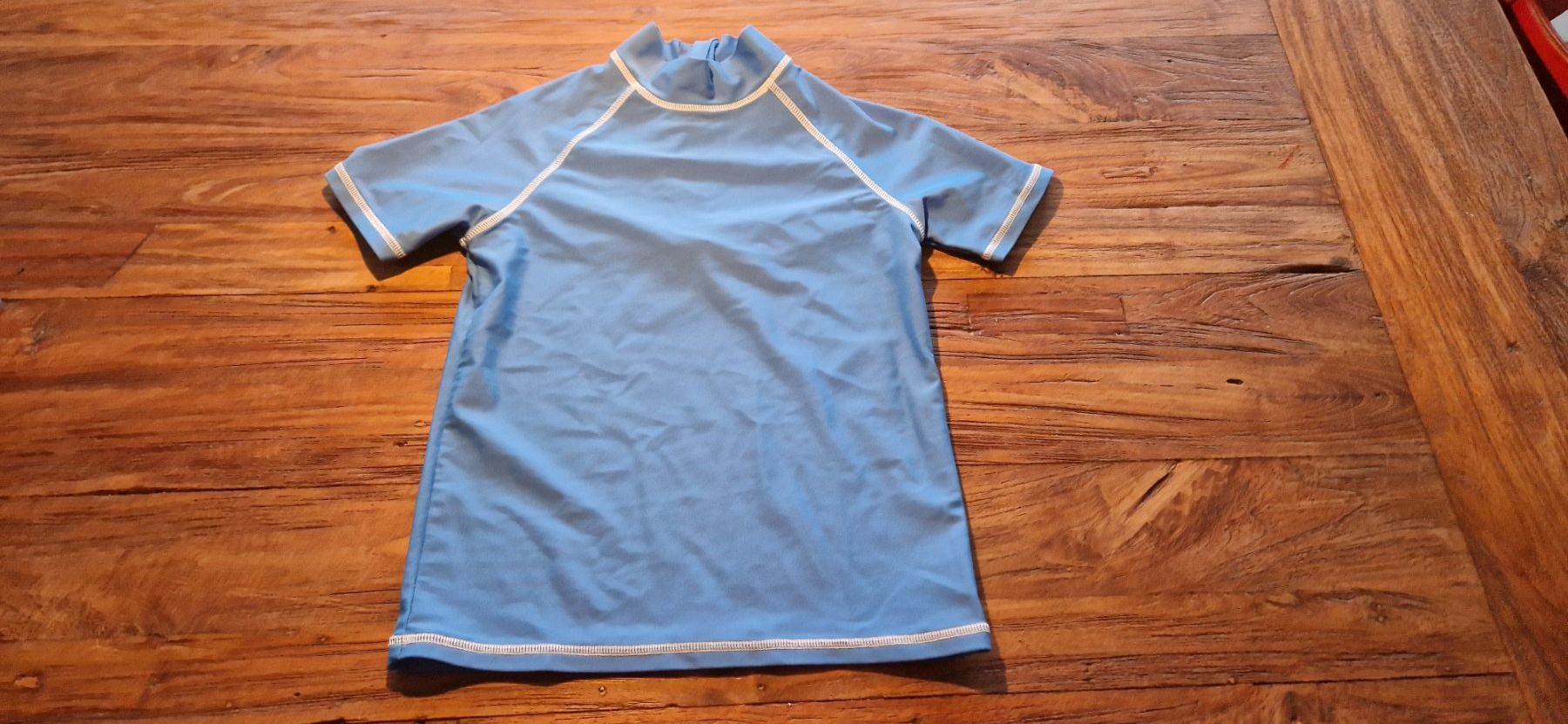 Migros Badehosen: UV Shirt gr.134/140 – Gebraucht aus Zeiningen von rimoni