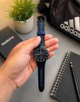 Montre Swatch Chronographe homme noir bleu bon état