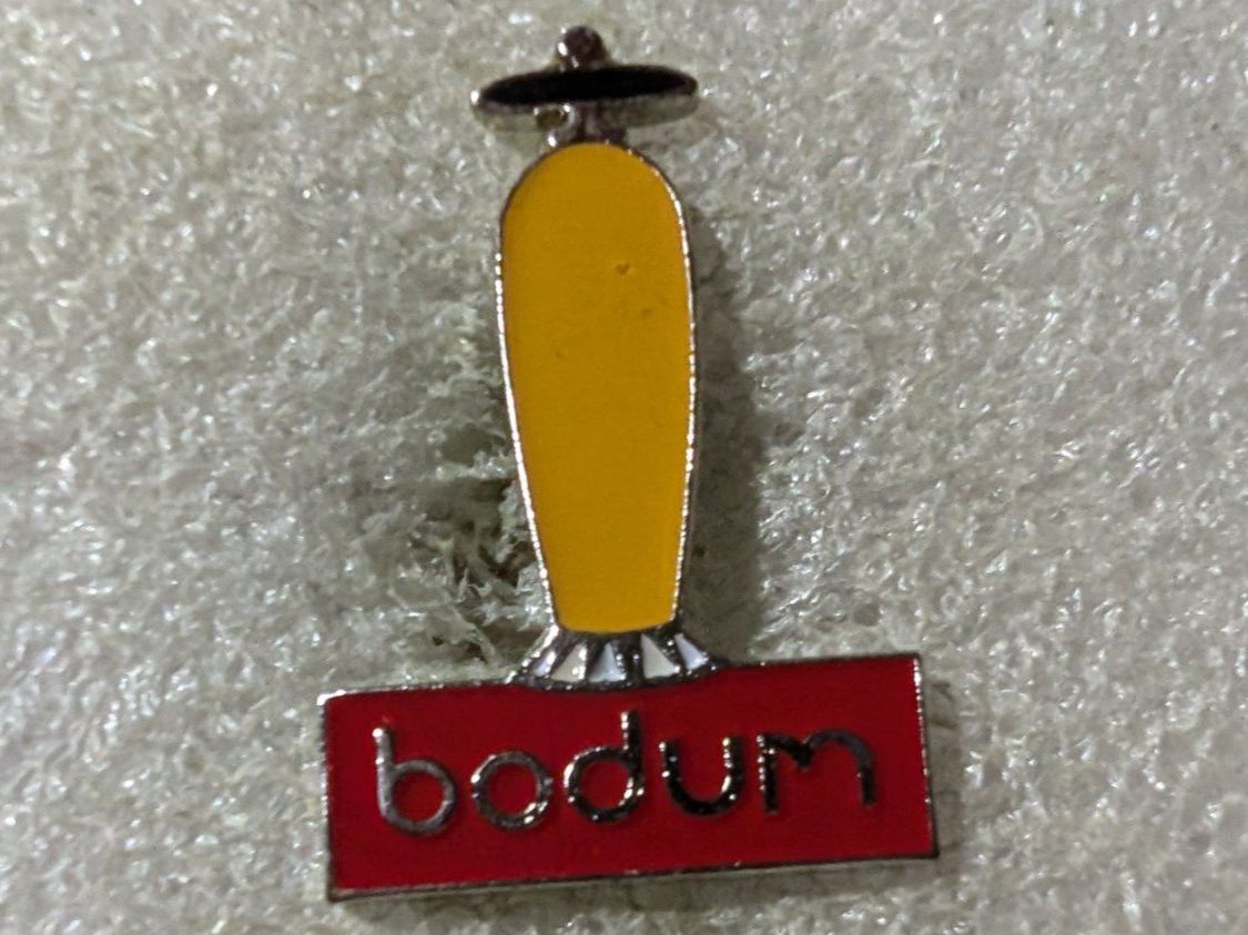 Placchette & Badge: Ansteckpin 205: Bodum – Usato da Oppligen venduto da Pin-Fall-Shop
