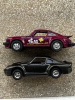 Zwei PORSCHE 911 in Dinky Toys Grösse