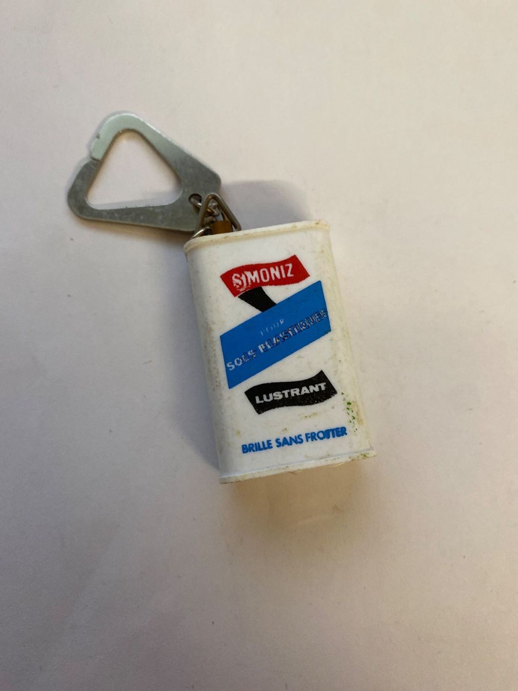 Portachiavi: Porte-clés Simoniz publicitaire, décapsuleur, occasion – Usato da Le Brassus venduto da cinema13