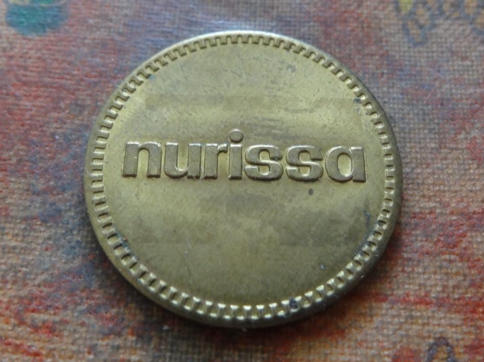 Tutti le monete: Jeton  "  NURISSA  "   (J) – Usato da Romanel-sur-Lausanne venduto da Swift13