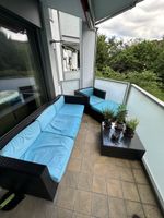 Outdoor Lounge Set aus Polyrattan mit Glastisch