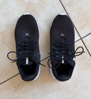 Puma Laufschuhe schwarz Grösse 38
