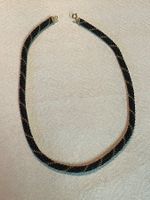 Kette mit Chrälleli schwarz, gold , glanz 52 cm Glasperlen