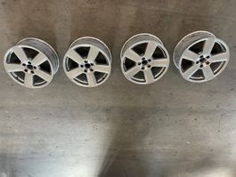 4 Alufelgen 5-Speichen Design silbern gebraucht