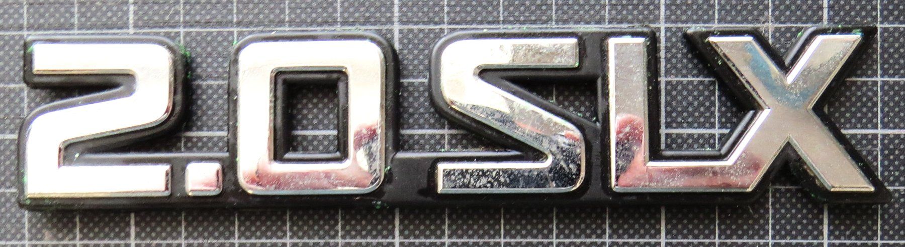 Nissan Alle Autoersatzteile: Nissan 2.0 SLX Schriftzug – Gebraucht aus Ettingen von campione_1