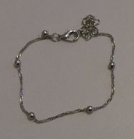 Armband silberfarbig mit 5 kleinen Kugeln