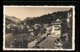 AK Arosa, Ortspartie mit Wald