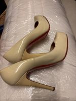Elegant Beige Louboutin High Heels, Size 37.5