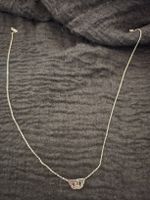 Collier Menottes dinh van or blanc 750 