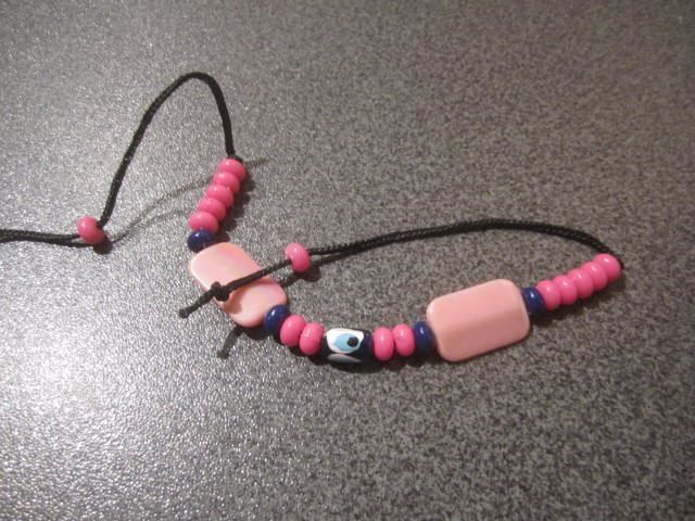 Bracciali & Braccialetti: Bändeli rosa, flache Steine – Usato da Zürich venduto da Motzkuh