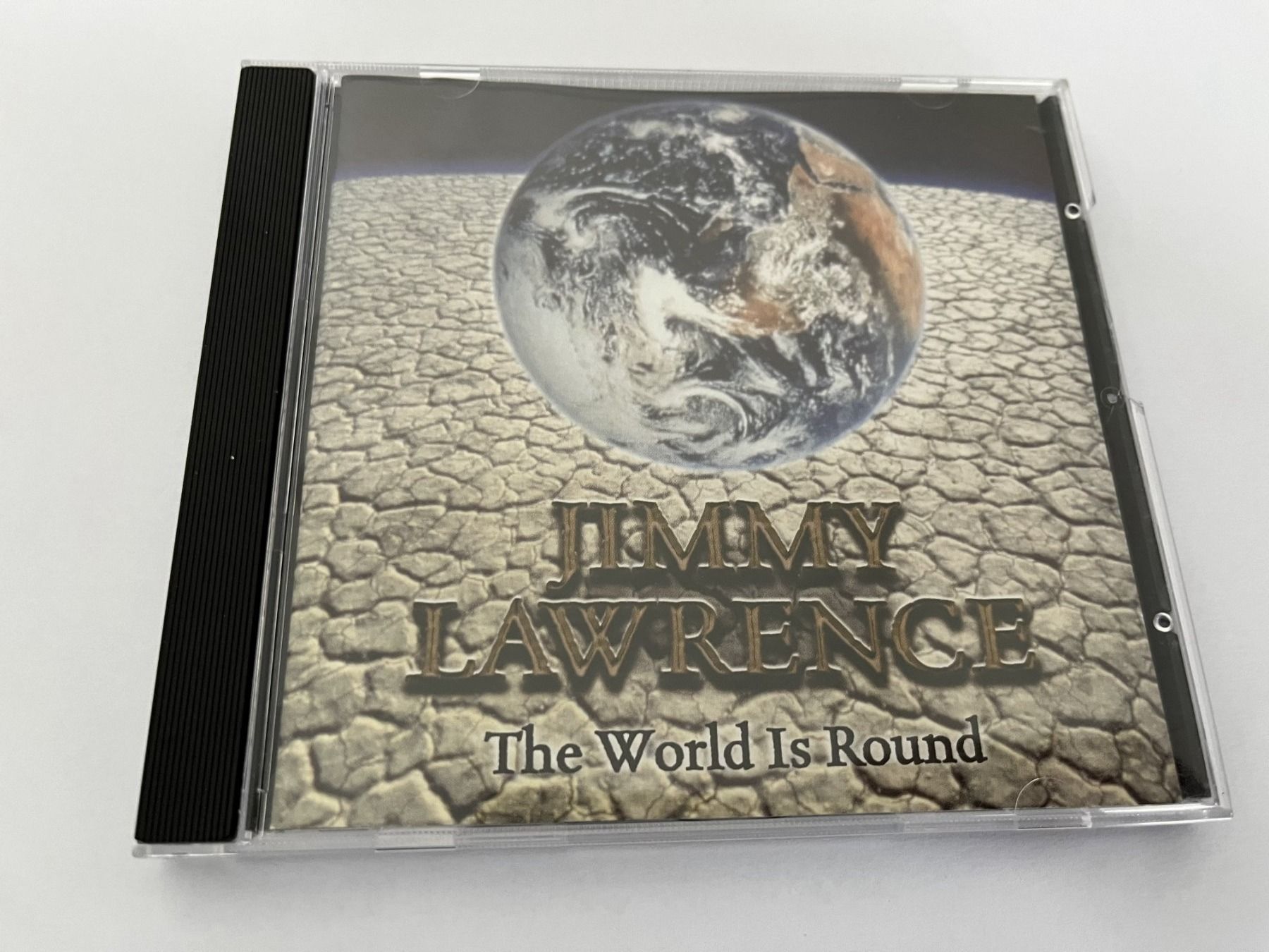 CD: JIMMY LAWRENCE - The world is round – Usato da Lohn-Ammannsegg venduto da Gladiator