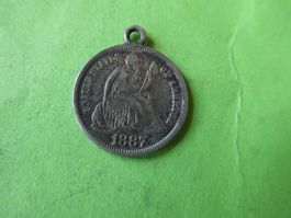 USA, Silbermünze von 1887 als Medaillon