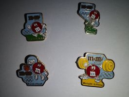 Pin.      M&M's