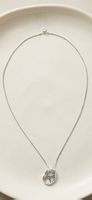 Collier Tory Burch argenté pendentif