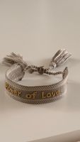 Power of Love Armband in graugold. Neu