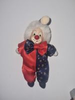 Kleine Porzellanpuppe Clown rot-blau Sternenmuster ca 14cm