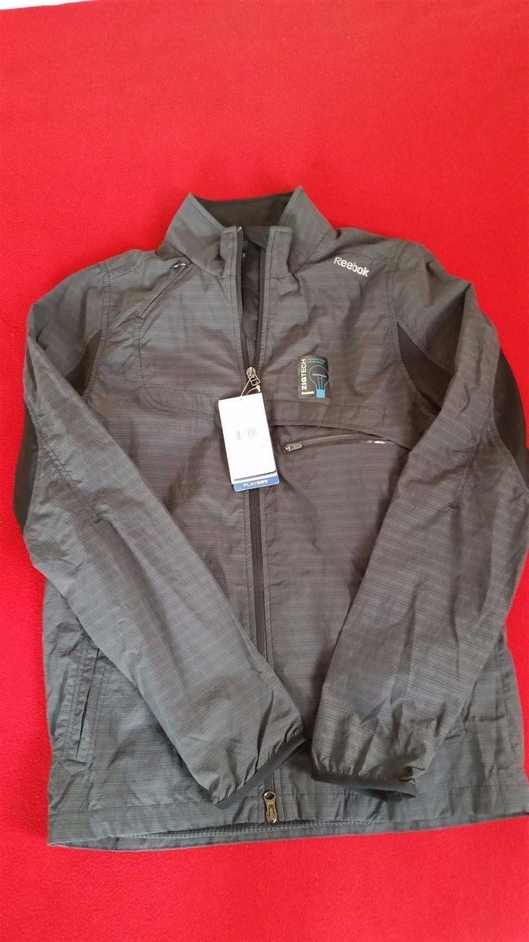 Reebok Giacche: Reebok Damen Jacke Windbreaker – Nuovo e nell'imballaggio originale da Winterberg ZH venduto da Gemini63