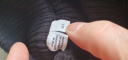 Schwarzer Wollpulli mit Stehkragen Gr L