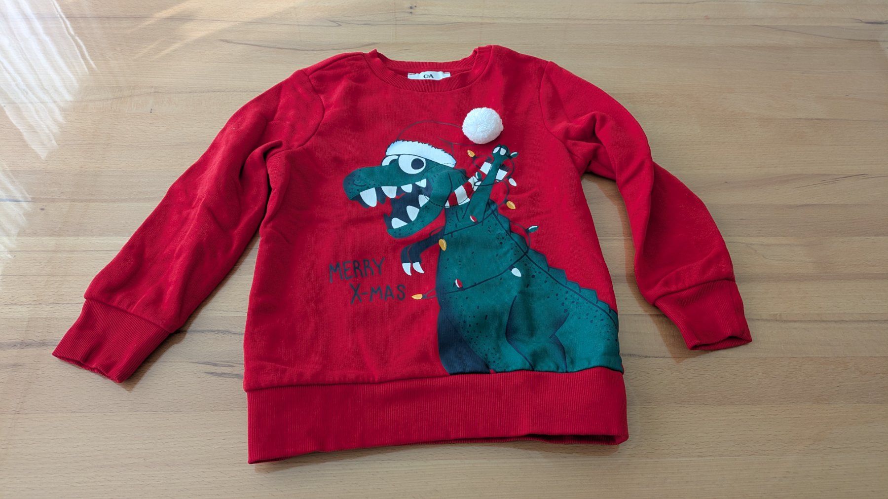 Maglioni & Felpe: XMAS Pullover - Weihnachtspullover - Dinosaurier - 122 – Usato da Staufen venduto da Fleby84