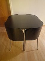 Esstischgruppe 4 Stühle schwarz Holz Metall guter Zustand