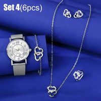 Damen Quarzuhr mit 4 Schmuck-Accessoires.