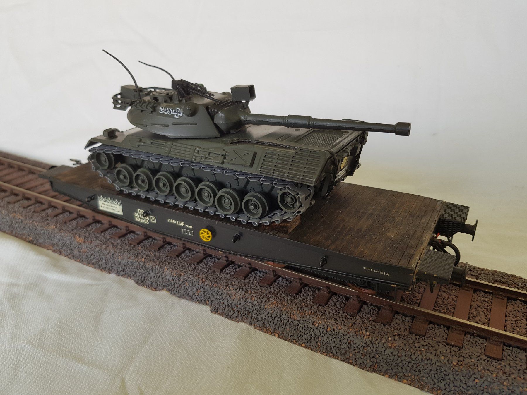 Modelleisenbahnen: Hehr: DB  Ssys beladen mit einem Panzer – Gebraucht aus Luzern von inca55