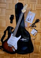 Guitare électrique neuve avec son lot d'accessoires