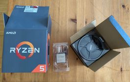AMD Ryzen 5 1600 Processor mit CPU Kühler.