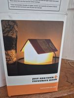 Lampe livre maison neuve