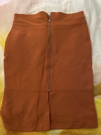 Jupe crayon orange avec fermeture éclair frontale