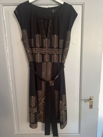 1 robe Maison 123 taille. 42 noir/brun selon photos