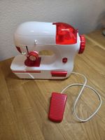 Funktionierende Kinder-Nähmaschine mit Zubehör