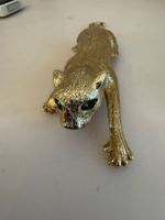Goldene Brosche Puma mit grünen Glitzeraugen