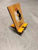 Support de téléphone en bambou neuf