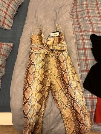 Tuta intera elegante serpente taglia L, nuova con etichetta.