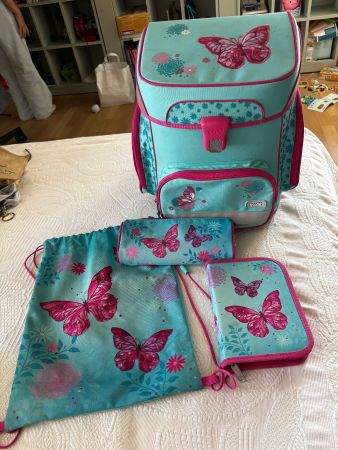 Set scolastico con farfalle turchese fucsia