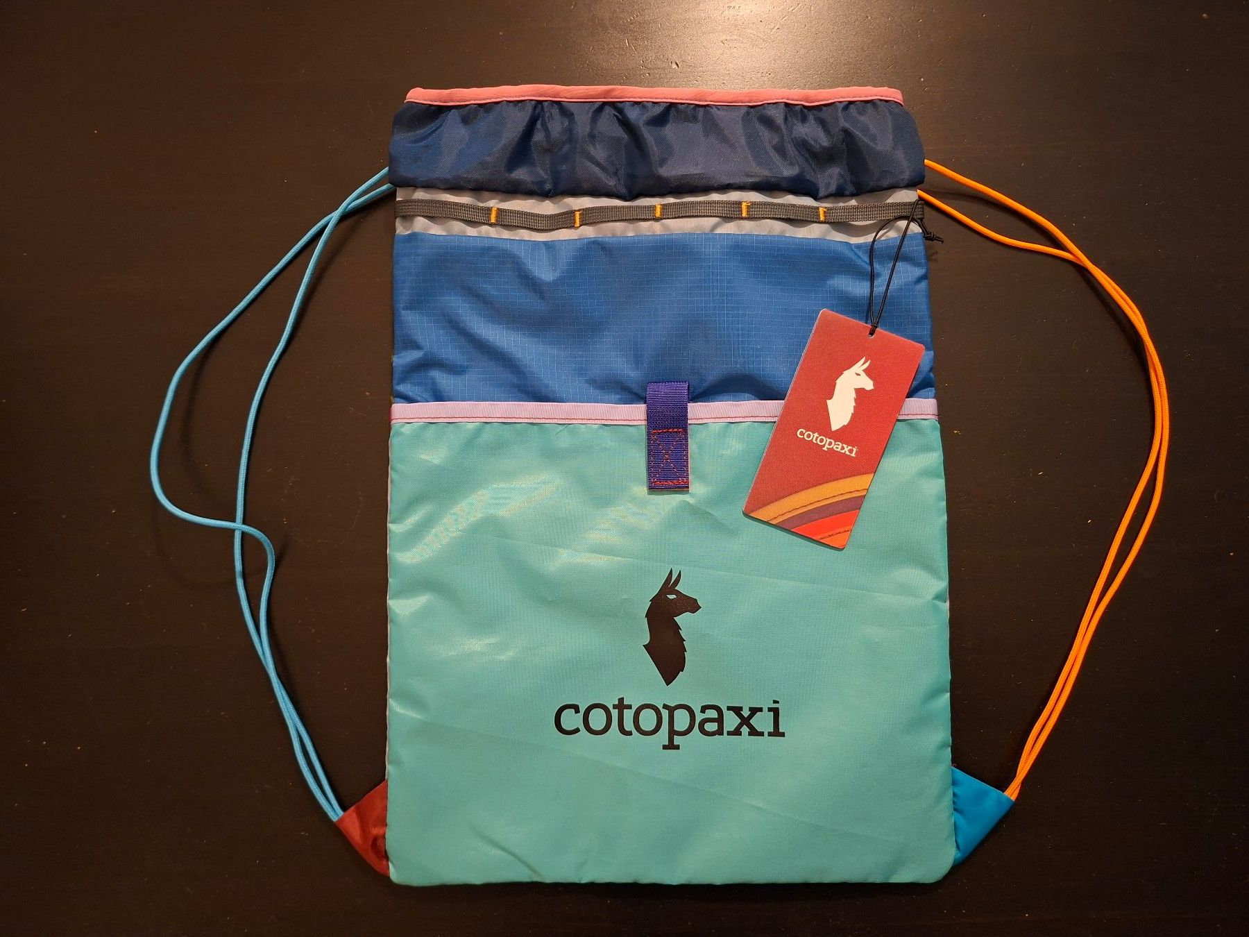 Cotopaxi Zaini: Cotopaxi Tago Drawstring Backpack (Turnbeutel, Hippster-Bag) – Nuovo e nell'imballaggio originale da Bern venduto da -noho-
