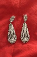 Boucle d’oreille plume avec strass