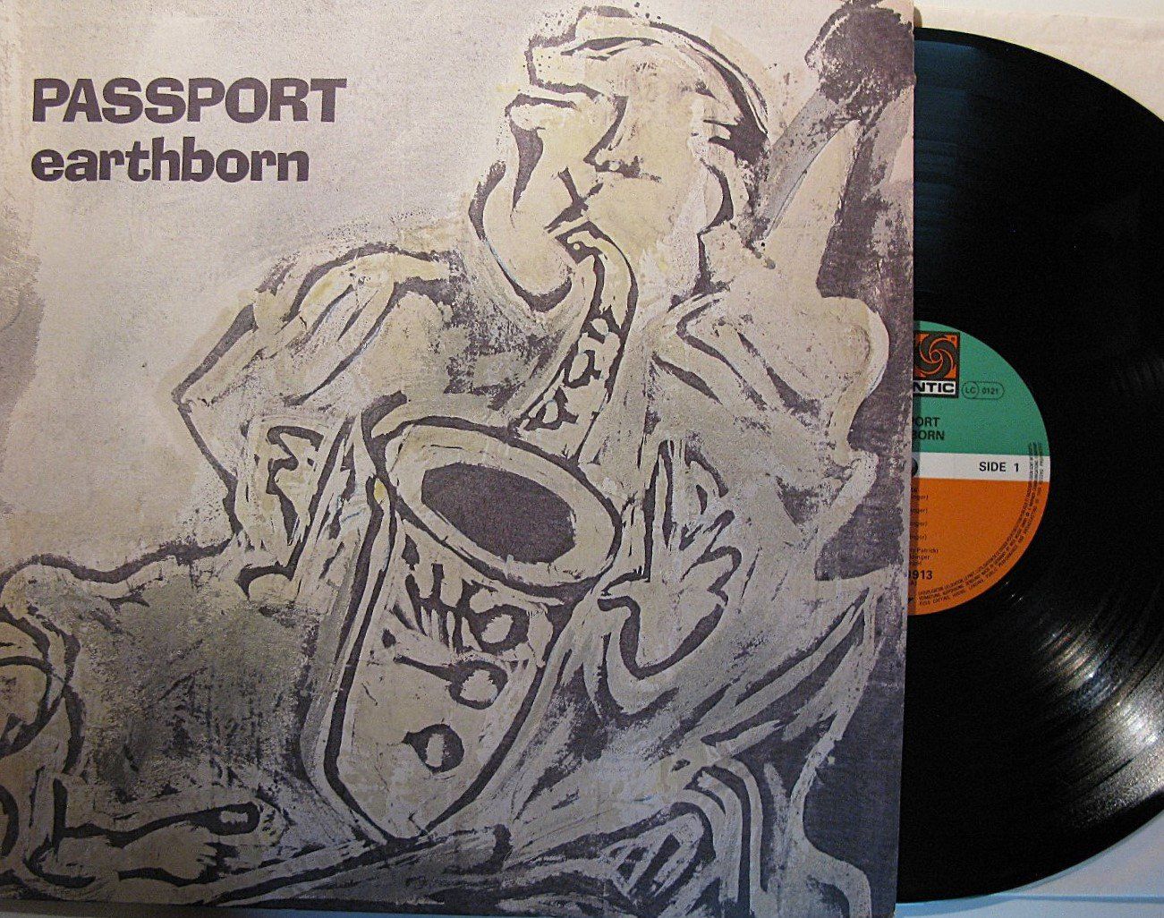 Schallplatten: PASSPORT "Earthborn"  LP in VG++/EX – Gebraucht aus Monthey von Pingmub