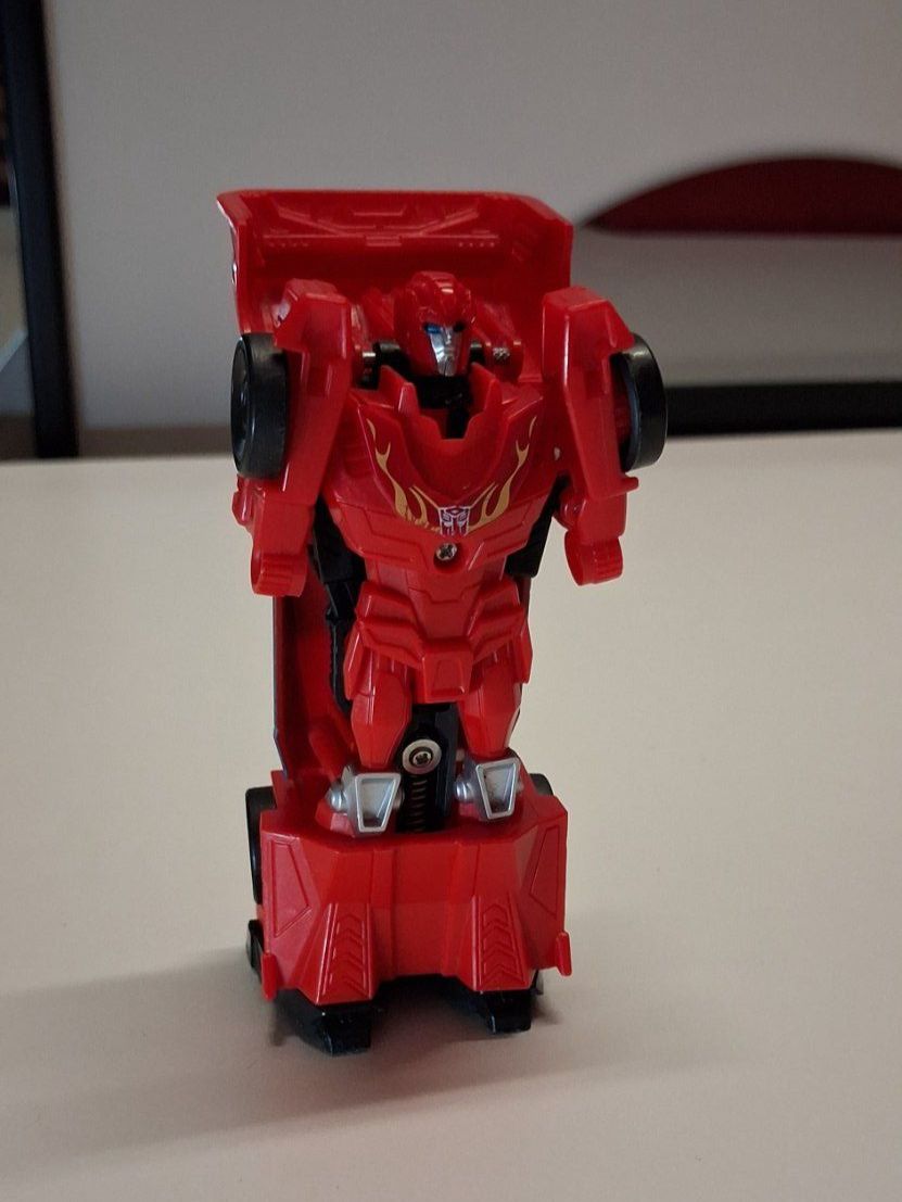 Spielzeuge: Transformers Auto Roboter rot – Gebraucht aus Bern von KavIndustries 1