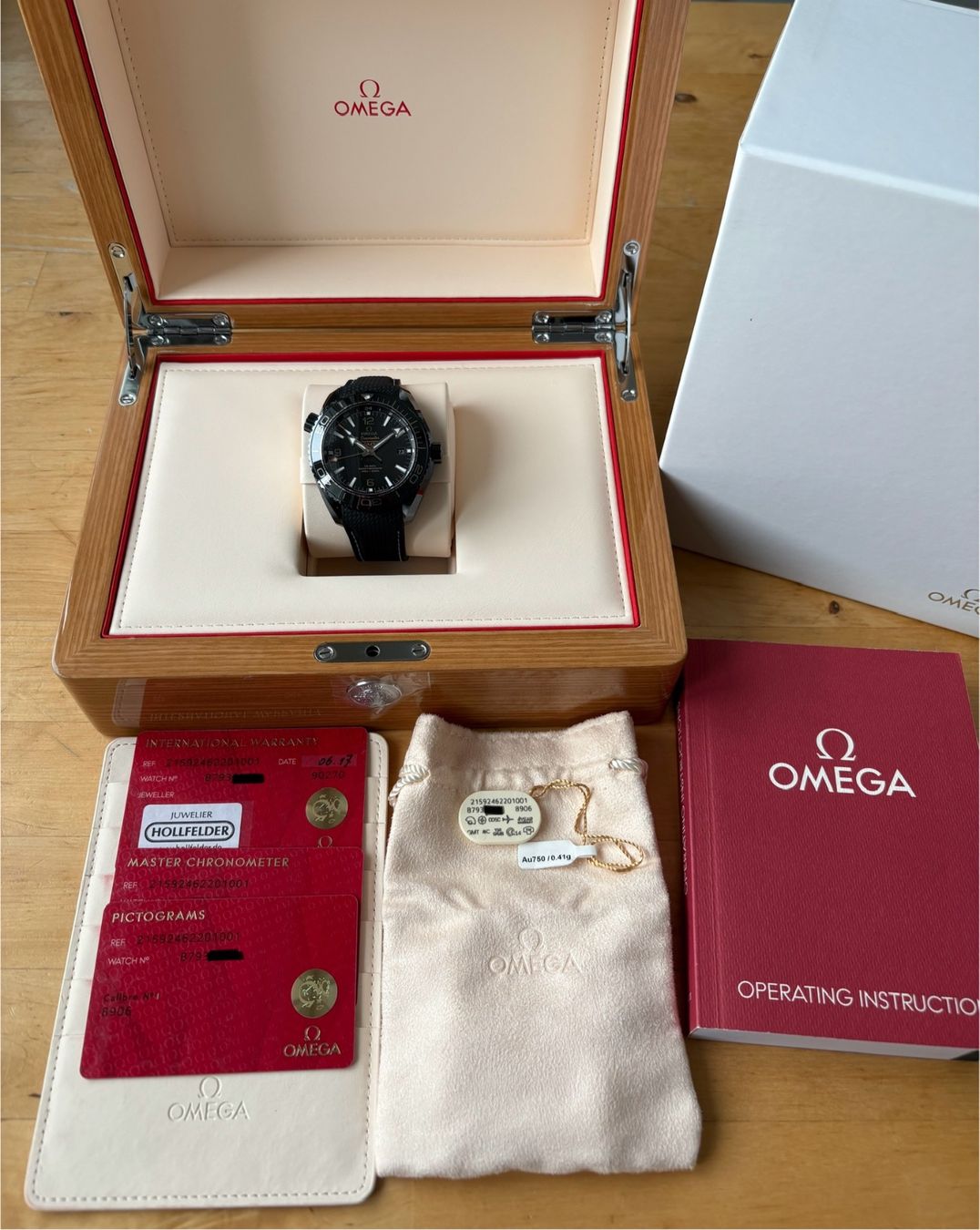Omega Montres: OMEGA Seamaster Planet Ocean GMT Deep Black Fullset – D'occasion à Birsfelden par Mynos 2