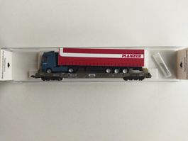 Niederflurwagen der SBB mit Planzer LKW von Fleischmann N