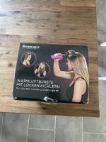 Warmluftbürste mit Lockenwicklern