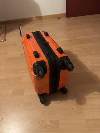 Hartschalenkoffer orange mit Rollen gebrauchter Zustand
