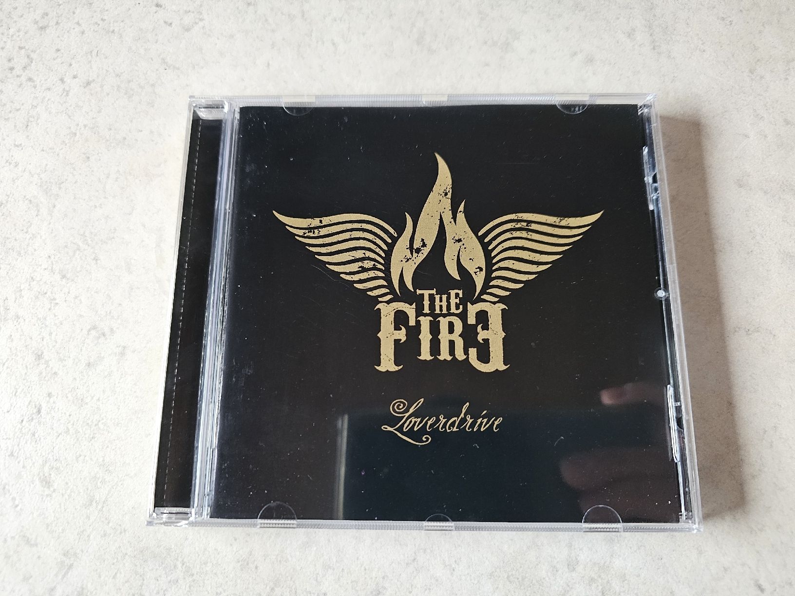 CD: The Fire  -  Loverdrive – Usato da Schneisingen venduto da backstore24